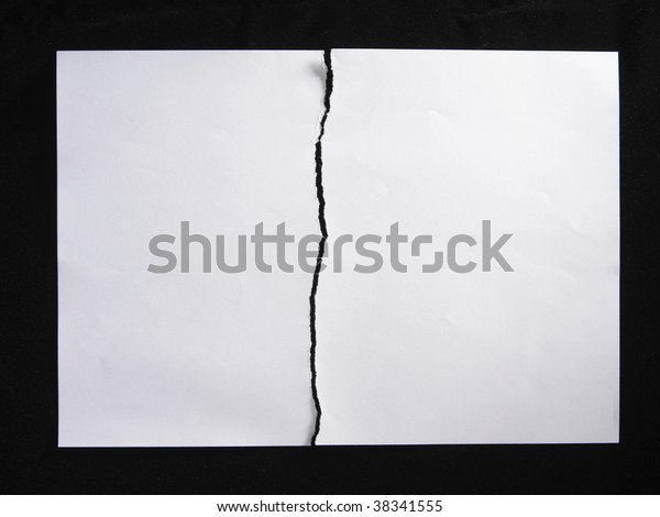 torn or tearing paper
into two pieces