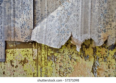 Torn Vintage Wallpaper Shreds And Peeling Paint Wall Texture.