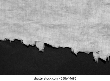 torn white fabric