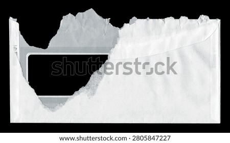 Torn window envelope with realistic paper texture, ripped edges on black background.