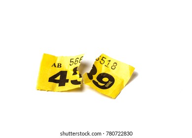 Torn Up Yellow Raffle Ticket. Losing Number