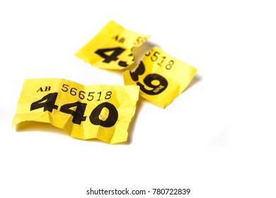 Torn Up Yellow Raffle Ticket. Losing Number