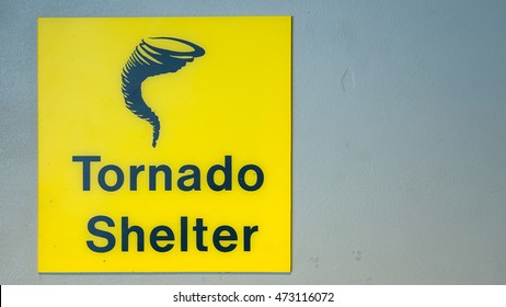 Tornado Shelter Sign On Door In Airport