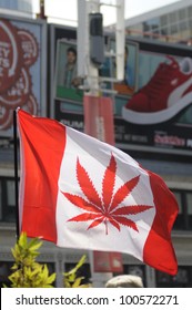 TORONTO - APRIL 20:  Canadian flag replaced my marijuana plant instead of maple leaf   during the annual marijuana 420 event at Yonge & Dundas Square  on April 20  2012 in Toronto, Canada.