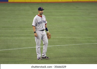 TORONTO - AUGUST 20: Third Base Mike Lowell Of Boston Red Sox Stands By Against Toronto Blue Jays At The Rogers Centre On August 20, 2009 In Toronto