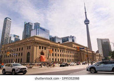 TORONTO, CANADA - 06 05 2021: Sunny Summer Day View With Union Station Building In Foreground, CN Tower And Glassy Skyscrapers In Downtown Of The Largest Candian City - Toronto