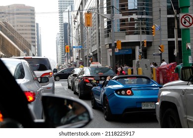 Toronto, Canada - 07-08-2018: A Taxi In Toronto Street Traffic