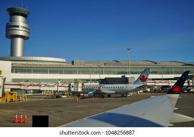 TORONTO, CANADA -10 MAR 2018- View of airplanes from Air Canada (AC) at the Toronto Pearson International Airport (YYZ), the largest and busiest airport in Canada and a hub for Air Canada.