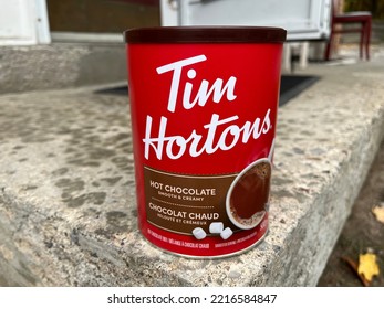 Toronto, Canada - 10-20-2022 - A Box Of Hot Chocolate Of Tim Hortons Seen At A Pavement In Toronto, Canada.