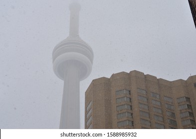 Toronto, Canada : 2019 
Silhouette Or Shadow Of CN Tower Seen During Heavy Snow Fall Or Blizzard Storm In Toronto. Located In Downtown, It's A Prominent Sign Of The Skyline.