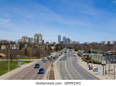 TORONTO, CANADA - 28TH APRIL 2014: A High View Showing Traffic Along Sheppard Avenue And Modern Condos In The Background In Uptown Toronto