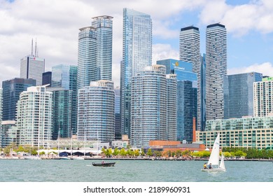 TORONTO, CANADA, 30TH JULY 22: A View Towards Part Of Toronto Downtown Skyline During A Sunny Day. Boats And People Can Be Seen.