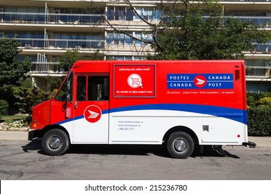 TORONTO, CANADA - 4TH SEPTEMBER 2014: A Canada Post Van Outside A Building During The Day