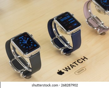 TORONTO, CANADA - APRIL 10, 2015: A couple of new Apple Watch sit at the retail store in Toronto. Apple begins the Apple Watch pre-order at the Canadian retail stores this day.
