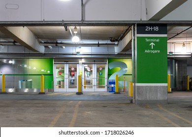 TORONTO, CANADA - April 18, 2020: Terminal Entrance In An Underground Garage At Toronto Pearson Airport Seen Empty During The Global COVID-19 Coronavirus Pandemic.