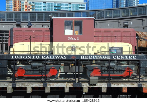 TORONTO, CANADA - APRIL 2,\
2014: Old train at the Roundhouse Park in Toronto. Roundhouse Park\
is a 17 acre park in Downtown Toronto in the former Railway\
Lands.