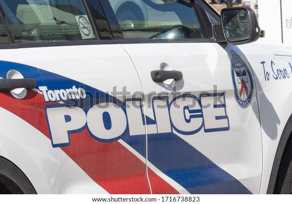 Toronto Canada, April 27, 2020; The Toronto\
Police Services logo on the door of a Marine Unit vehicle on the\
Toronto waterfront