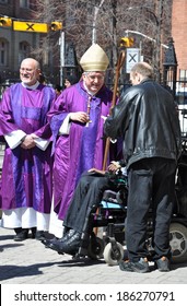 Toronto, Canada - April 7,2014: His Eminence, Thomas Cardinal Collins, Archbishop Of Toronto Talking To His Parishioners After Sunday Mass At St. Michael's Cathedral.