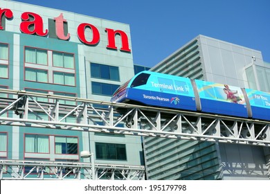 TORONTO, CANADA - APRIL 9, 2014: Terminal monorail shuttle at the Pearson airport in Toronto. In 2011, Toronto Pearson handled 33.4 million passengers and 428,477 aircraft movements.