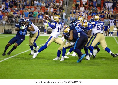 Toronto, Canada - Aug 1, 2019: Winnipeg Blue Bombers Quarterback Matt Nichols (15) Throwing Down Field During Winnipeg Blue Bombers At Toronto Argonauts Game At BMO Field In Toronto, ON