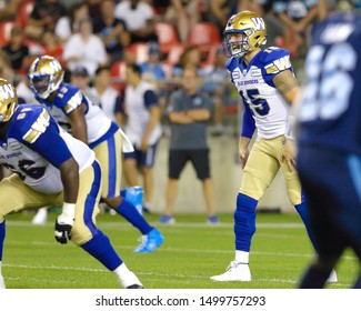 Toronto, Canada - Aug 1, 2019: Winnipeg Blue Bombers Quarterback Matt Nichols (15) Pre Snap During Winnipeg Blue Bombers At Toronto Argonauts Game In Toronto, ON