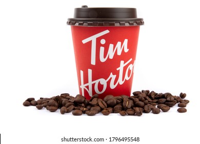 Toronto, Canada, August 15, 2020; A take out cup of Tim Horton's coffee surrounded by coffee beans to indicate fresh brewed