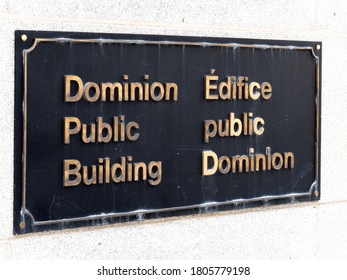 Toronto, Canada, August 29, 2020; The Plaque At The Entrance To The Dominion Public Building, A Historic Government Building In Downtown Toronto, Now Known Mainly As The Income Tax Filing Office