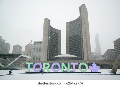 Toronto, Canada, Circa February 2017: Nathan Phillips Square In Snowy Winter And Toronto Sign.