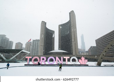 Toronto, Canada, Circa February 2017: Nathan Phillips Square In Snowy Winter And Toronto Sign.