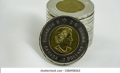 TORONTO CANADA - DEC 12 2019: Canadian $2 Dollar Coin Or Toonie On White Background