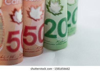 TORONTO CANADA - DEC 6, 2019: Canadian $50 And $20 Dollar Bills On White Background