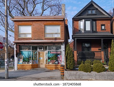 Toronto, Canada - December 11, 2020:  Old Fashioned Corner Store On A Residential Street, Of The Type That Has Mostly Been Replaced By Big Box Stores.