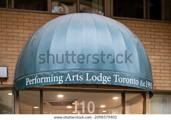 Toronto, Canada, December 29, 2021; The curved\
awing and sign at the entrance to the Performing Arts Lodge in\
Toronto, a senior living facility for members of the performing\
arts community
