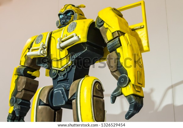 TORONTO CANADA - FEB 23 2019: Volkswagen brought\
a 15 foot tall Bumblebee replica at the Canadian International Auto\
Show in Toronto