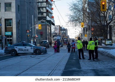 Toronto Canada Feb 5 2022: Peaceful Protest Against Covid 19 Mandates And Restrictions And Mandatory Vaccination In Toronto City Downtown.