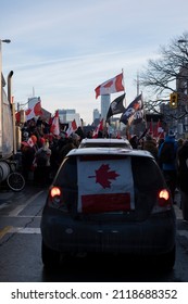 Toronto Canada Feb 5 2022: Peaceful Protest Against Covid 19 Mandates And Restrictions And Mandatory Vaccination In Toronto City Downtown.