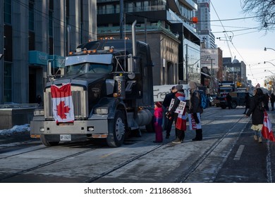 Toronto Canada Feb 5 2022: Peaceful Protest Against Covid 19 Mandates And Restrictions And Mandatory Vaccination In Toronto City Downtown.