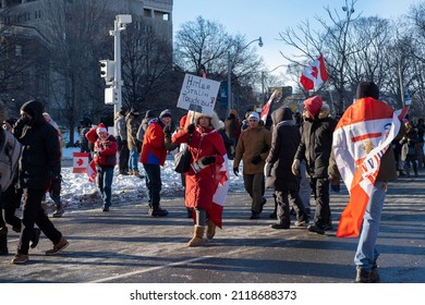 Toronto Canada Feb 5 2022: Peaceful Protest Against Covid 19 Mandates And Restrictions And Mandatory Vaccination In Toronto City Downtown.