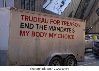 Toronto Canada Feb 5 2022: Sign Trudeau For Treason End The Mandates My Body My Choice In  Trucks At Peaceful Protest Against Covid 19 Mandates, Restrictions And Mandatory Vaccination In Toronto City.