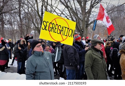 TORONTO, CANADA - JANUARY 22, 2022: People supporting the Freedom Convoy 2022 leaving Toronto to Ottawa.
