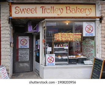 Toronto, Canada - January 31, 2021:  Older neighborhoods of Toronto preserve some interesting independent stores such as this old-fashioned bakery.