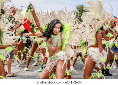 TORONTO, CANADA - JULY 20, 2016: People Dancing At The Toronto Caribbean Carnival, Formerly Called Caribana, A Festival Of Caribbean Culture And Traditions Held Each Summer.