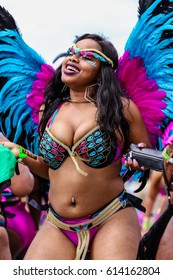 TORONTO, CANADA - JULY 20, 2016: Woman In Costume Dancing At The Toronto Caribbean Carnival, Formerly Called Caribana, A Festival Of Caribbean Culture And Traditions Held Each Summer. 