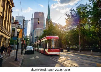 TORONTO, CANADA - JULY 26, 2021: New Bombardier TTC streetcar on King Street East in Old Toronto