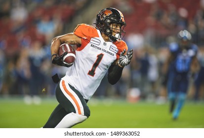 Toronto, Canada - July 6, 2019: BC Lions Wide Receiver Lemar Durant (1) Running After The Catch During The BC Lions At Toronto Argonauts Game At BMO Field In Toronto, ON 