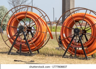 Toronto, Canada, July 8, 2020; Reels Of Orange Conduit For Fiber Optic Cable Installation