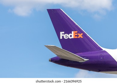 Toronto Canada, June 10, 2022; Rudder And Tail Plane Logo Of A FedEx Windowless Boeing 757 Cargo Jet Airliner Arriving For Landing At Toronto Pearson Airport YYZ Federal Express Distribution Centre