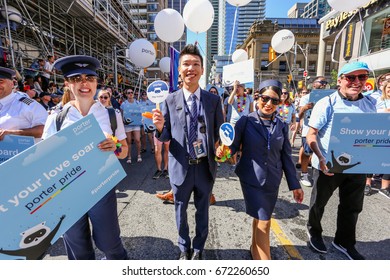 TORONTO, CANADA - JUNE 25, 2017: PORTER AIRLINES employees march at 2017 Toronto Pride Parade. 