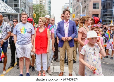 TORONTO, CANADA - JUNE 25, 2017: National Chief Perry Bellegard, Toronto Mayor John Tory, Ontario Premier Kathleen Wynne, Canadian Prime Minister Justin Trudeau, Sophie Grégoire Trudeau At Parade.