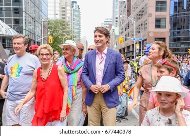 TORONTO, CANADA - JUNE 25, 2017: National Chief Perry Bellegard, Toronto Mayor John Tory, Ontario Premier Kathleen Wynne, Canadian Prime Minister Justin Trudeau, Sophie Grégoire Trudeau At Parade.